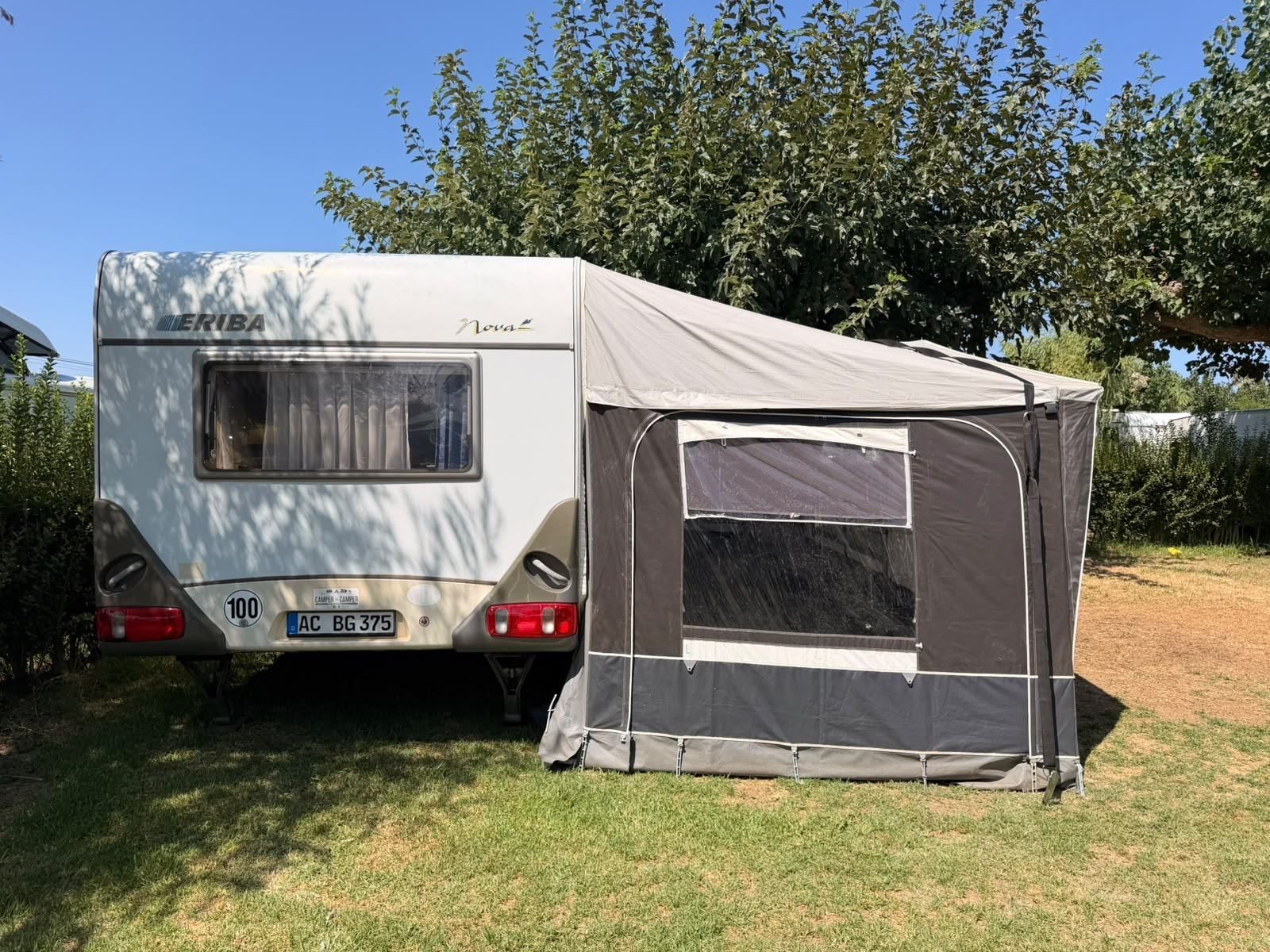 Eriba caravan with an awning on its pitch