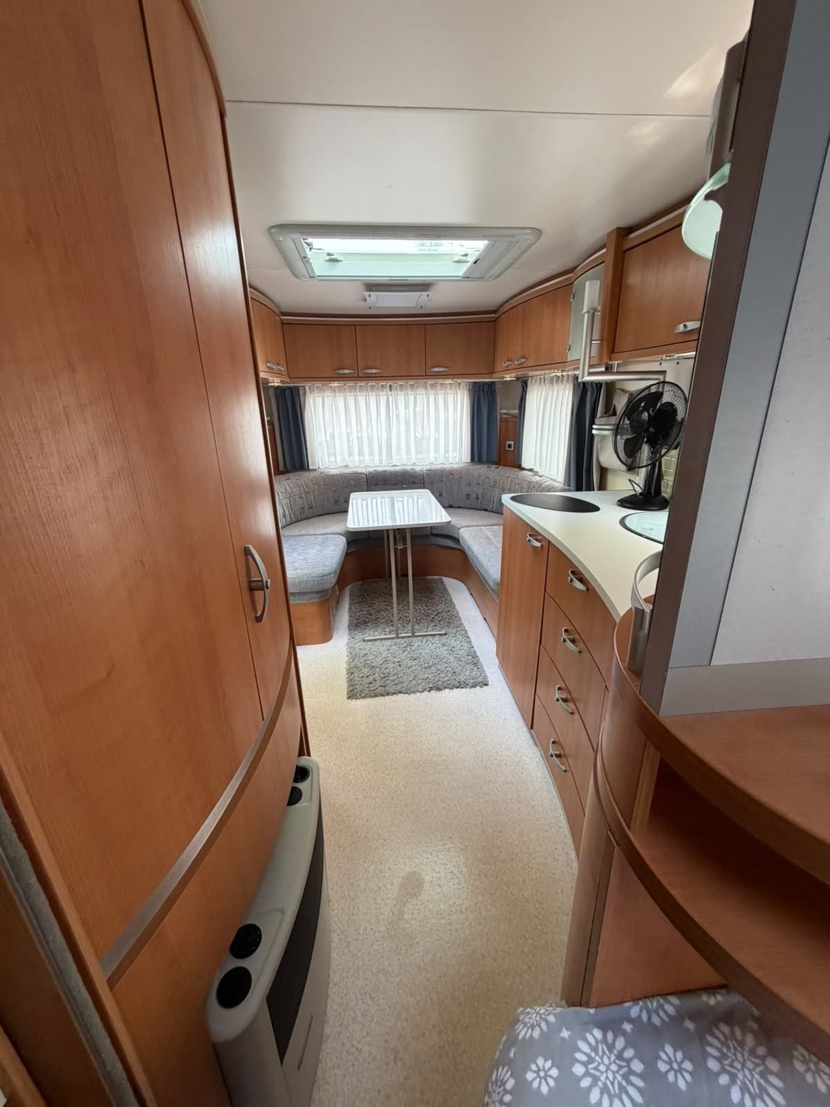 Caravan interior looking towards the front dinette