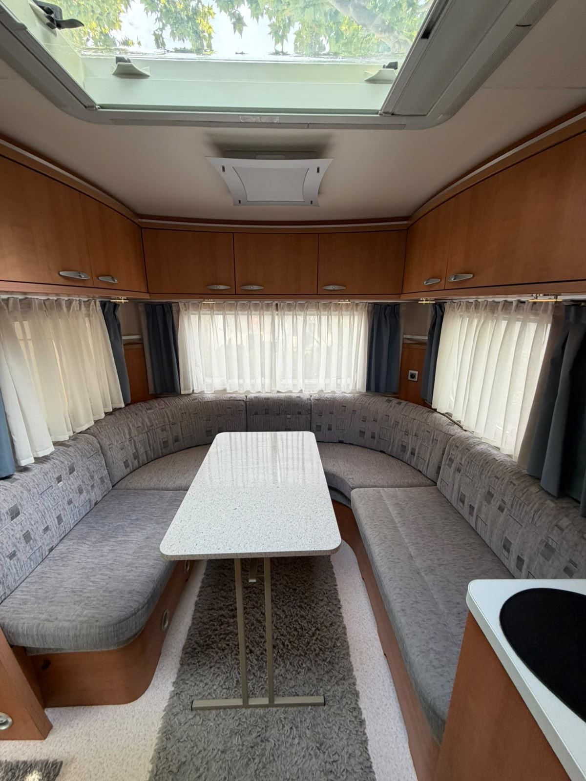Caravan dinette under a large skylight