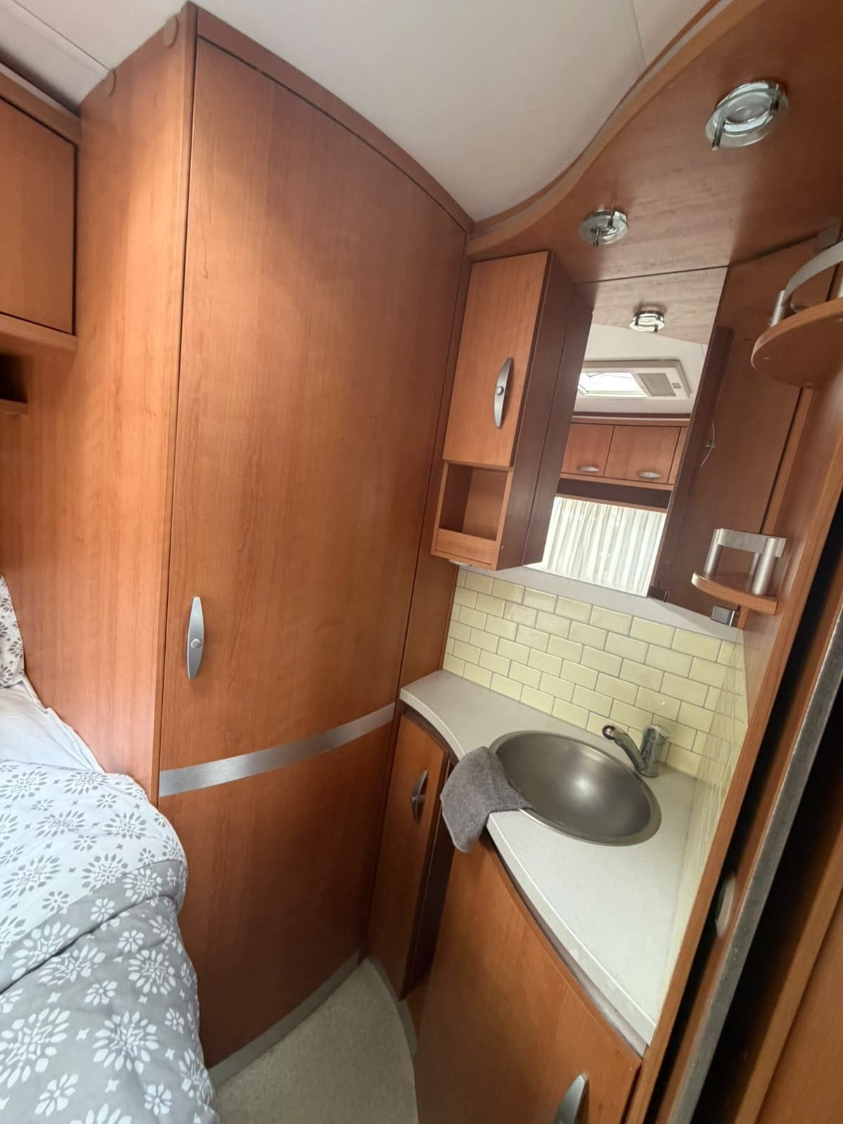 Caravan washbasin with a mirror cabinet