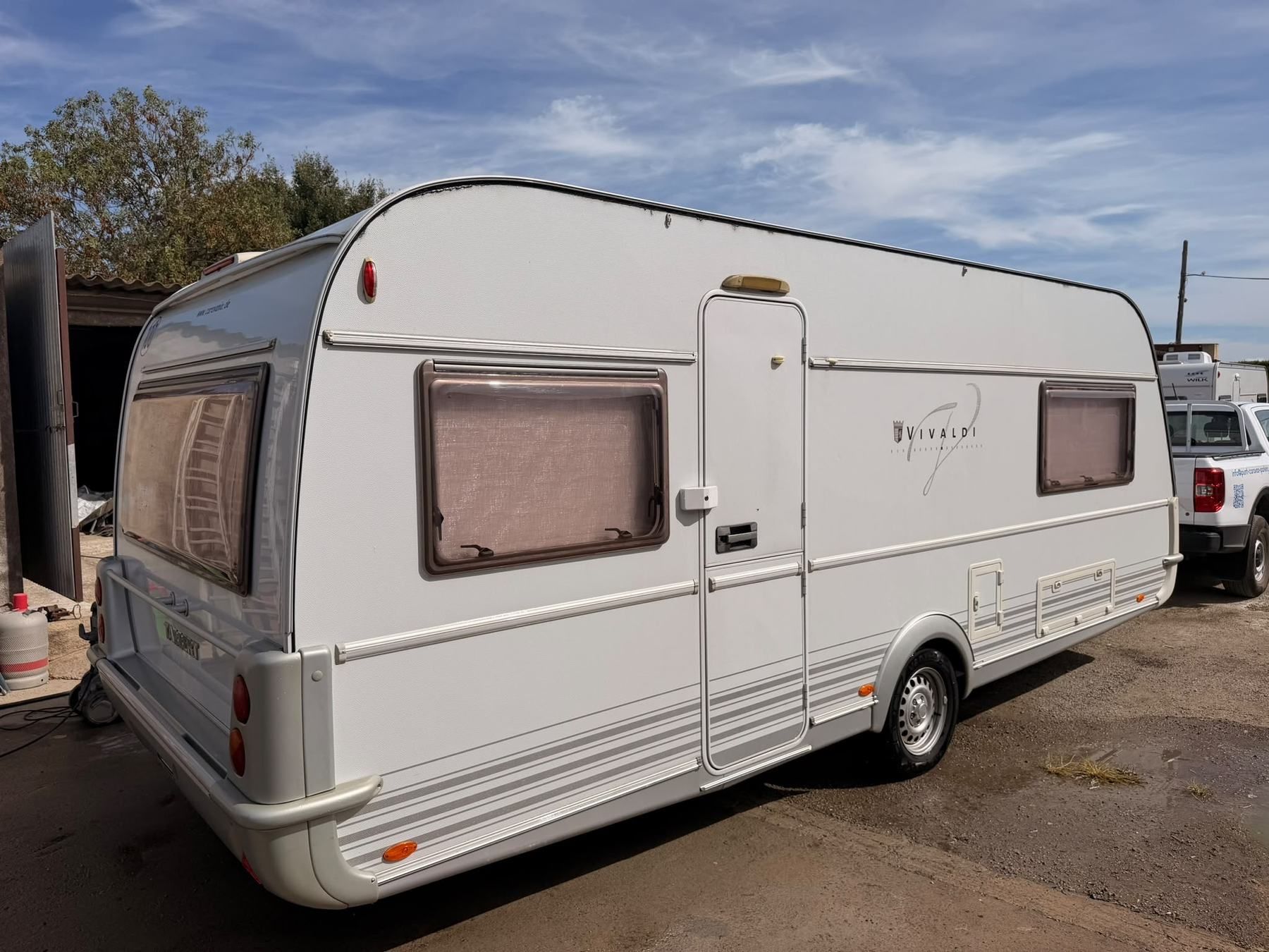 Freshly washed Vivaldi caravan, side view